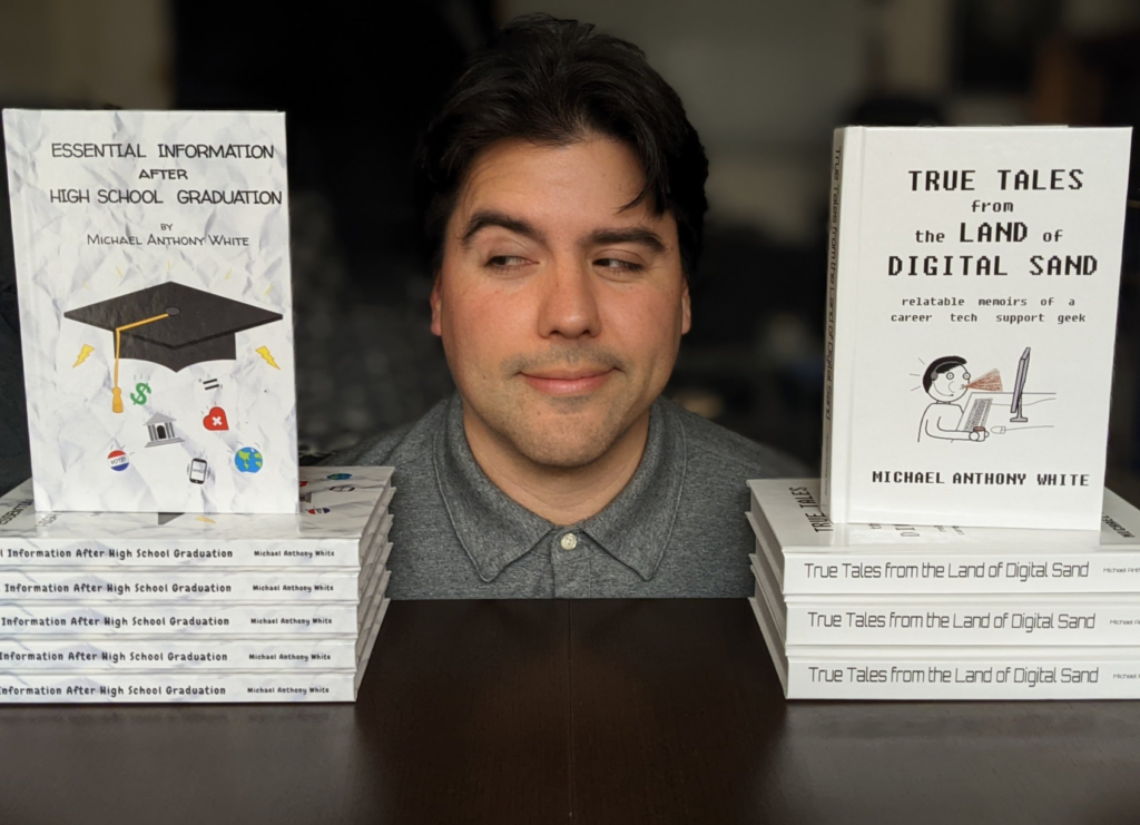 Michael Anthony White with books "True Tales from the Land of Digital Sand" and "Essential Information After High School Graduation"